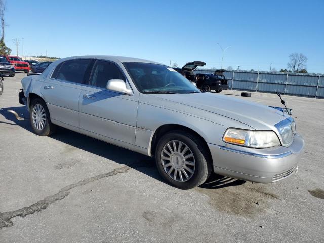 Photo 4 from auction – 2004 LINCOLN TOWN CAR E with VIN 1LNHM81W44Y619793