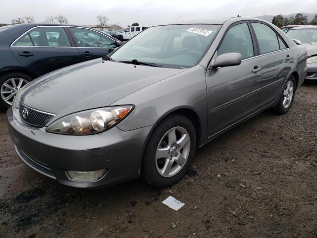 TOYOTA CAMRY LE 2005 with VIN 4T1BE30K45U556904 - Photo from auction