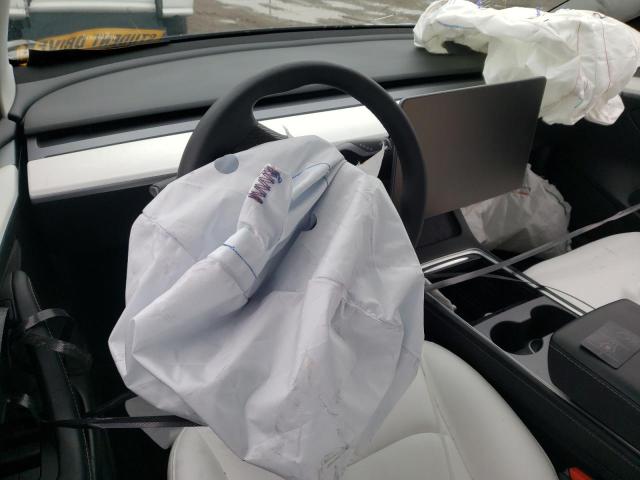 Photo 8 from auction – 2021 TESLA MODEL 3 with VIN 5YJ3E1EC3MF995565