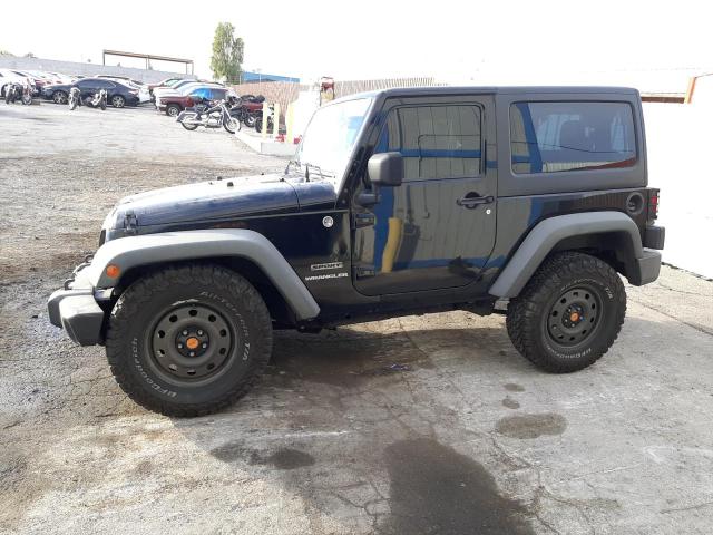 JEEP WRANGLER S 2011 with VIN 1J4AA2D17BL566071 - Photo from auction