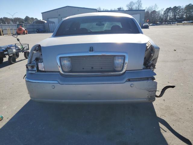 Photo 6 from auction – 2004 LINCOLN TOWN CAR E with VIN 1LNHM81W44Y619793