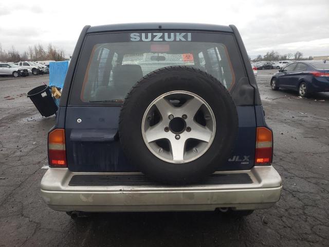 Photo 6 from auction – 1996 SUZUKI SIDEKICK S with VIN JS3TD21VXT4100998