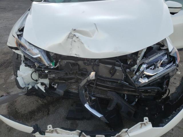 Photo 12 from auction – 2016 NISSAN ROGUE S with VIN 5N1AT2MV8GC847415