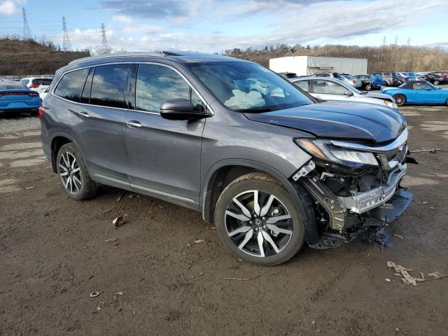Photo 4 from auction – 2022 HONDA PILOT TOUR with VIN 5FNYF6H65NB051676