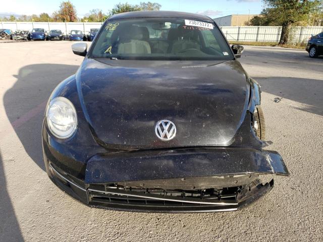 Photo 5 from auction – 2012 VOLKSWAGEN BEETLE TUR with VIN 3VWVA7AT2CM604166