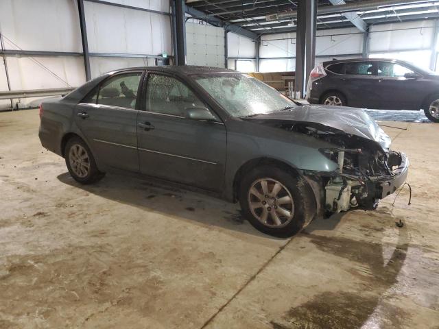 Photo 4 from auction – 2003 TOYOTA CAMRY LE with VIN JTDBF30K930137601