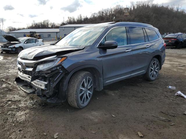 HONDA PILOT TOUR 2022 with VIN 5FNYF6H65NB051676 - Photo from auction