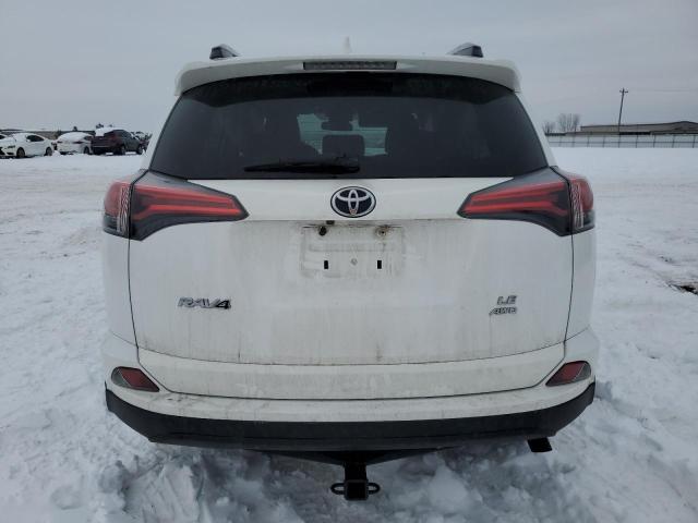 Photo 6 from auction – 2017 TOYOTA RAV4 LE with VIN 2T3BFREV3HW619411