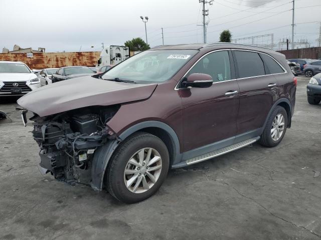 KIA SORENTO LX 2016 with VIN 5XYPG4A37GG126077 - Photo from auction