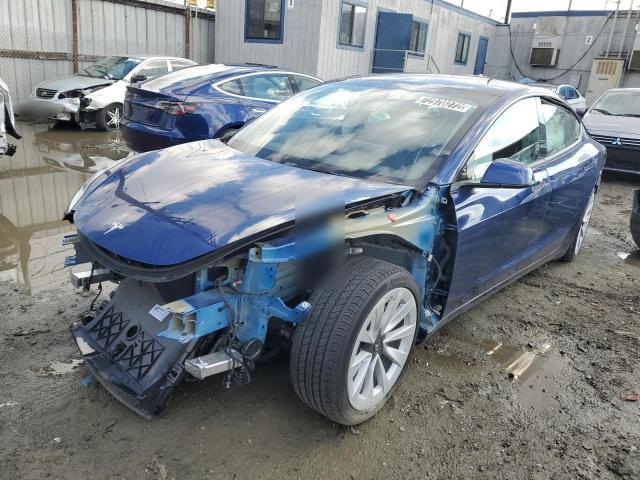 TESLA MODEL 3 2022 with VIN 5YJ3E1EAXNF144542 - Photo from auction