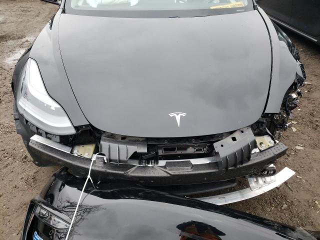 Photo 11 from auction – 2021 TESLA MODEL 3 with VIN 5YJ3E1EC3MF995565