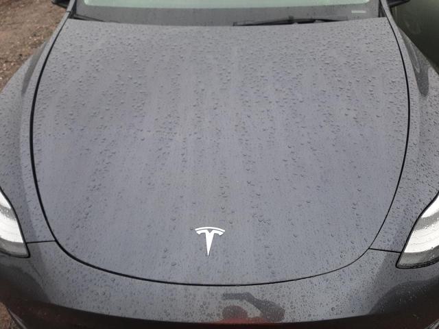 Photo 11 from auction – 2021 TESLA MODEL Y with VIN 5YJYGDEE9MF208525