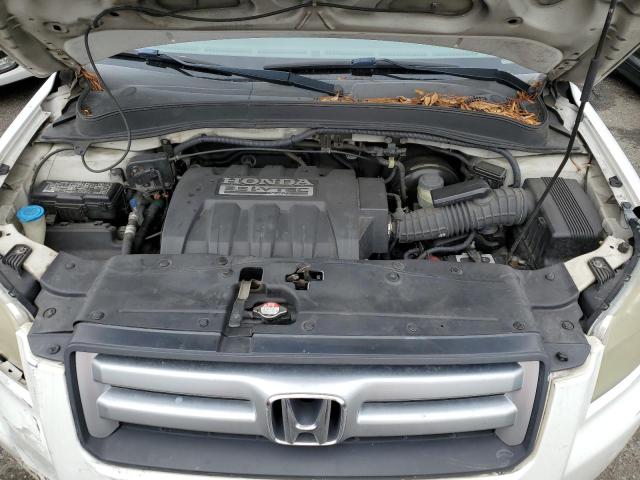 Photo 12 from auction – 2006 HONDA PILOT EX with VIN 5FNYF28606B045021