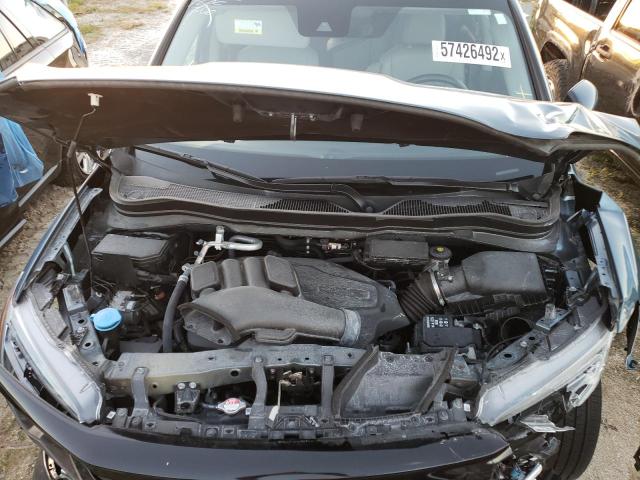 Photo 11 from auction – 2021 HONDA PILOT SE with VIN 5FNYF5H23MB042528