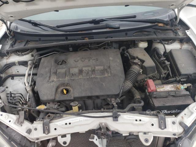 Photo 11 from auction – 2014 TOYOTA COROLLA L with VIN 5YFBURHE8EP007308