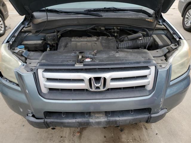 Photo 12 from auction – 2006 HONDA PILOT EX with VIN 2HKYF18726H543824