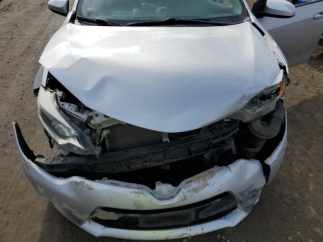 Photo 11 from auction – 2014 TOYOTA COROLLA L with VIN 5YFBURHE6EP110680
