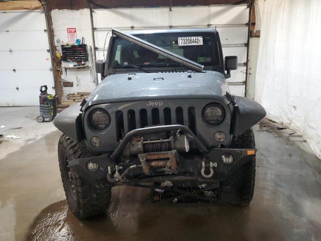 Photo 5 from auction – 2014 JEEP WRANGLER U with VIN 1C4BJWDG9EL157161