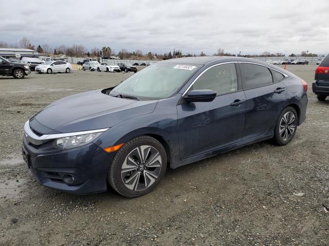 HONDA CIVIC EX 2018 with VIN JHMFC1F32JX004101 - Photo from auction