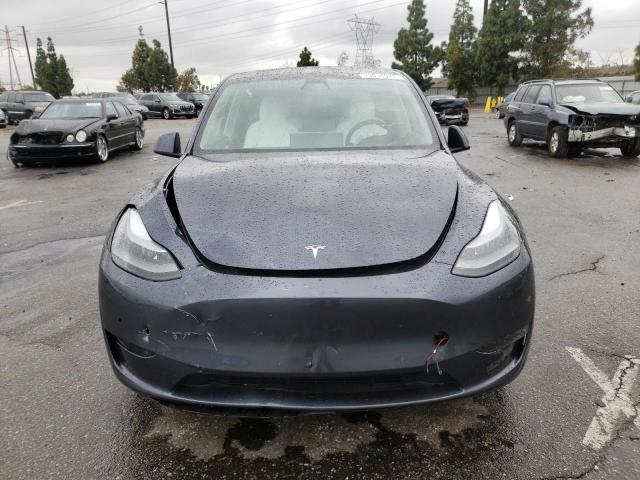 Photo 5 from auction – 2022 TESLA MODEL Y with VIN 7SAYGDEF2NF392459