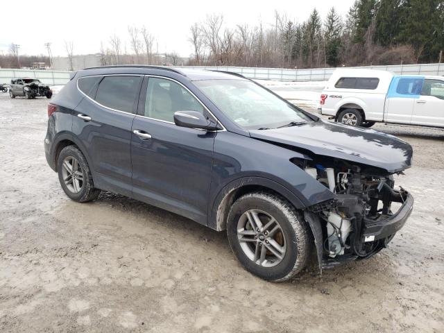 Photo 4 from auction – 2018 HYUNDAI SANTA FE S with VIN 5NMZU3LB8JH097119