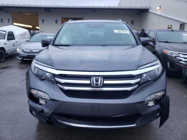 Photo 5 from auction – 2017 HONDA PILOT TOUR with VIN 5FNYF6H94HB058570