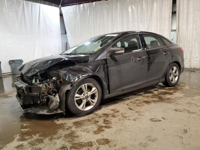 FORD FOCUS SE 2014 with VIN 1FADP3F25EL202075 - Photo from auction