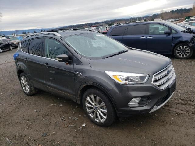 Photo 4 from auction – 2018 FORD ESCAPE TIT with VIN 1FMCU9J95JUC62184