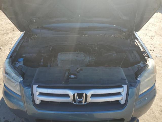 Photo 11 from auction – 2006 HONDA PILOT EX with VIN 2HKYF18756H556499