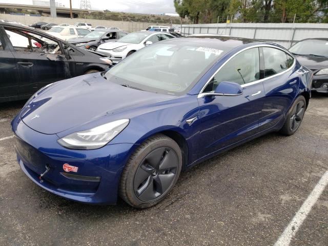 TESLA MODEL 3 2018 with VIN 5YJ3E1EA0JF052091 - Photo from auction