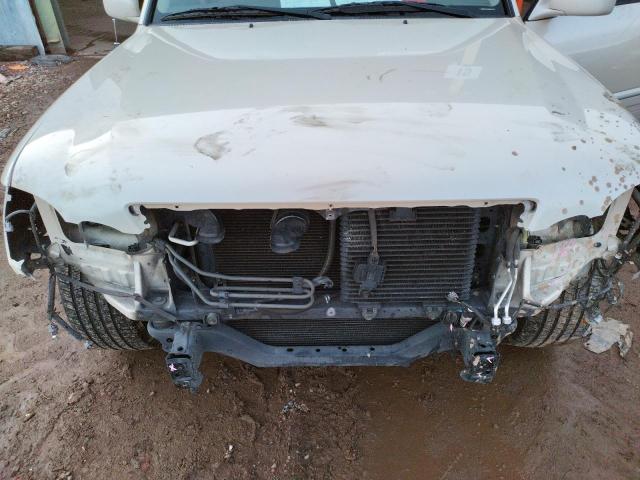 Photo 11 from auction – 2004 LEXUS LX 470 with VIN JTJHT00W043543784