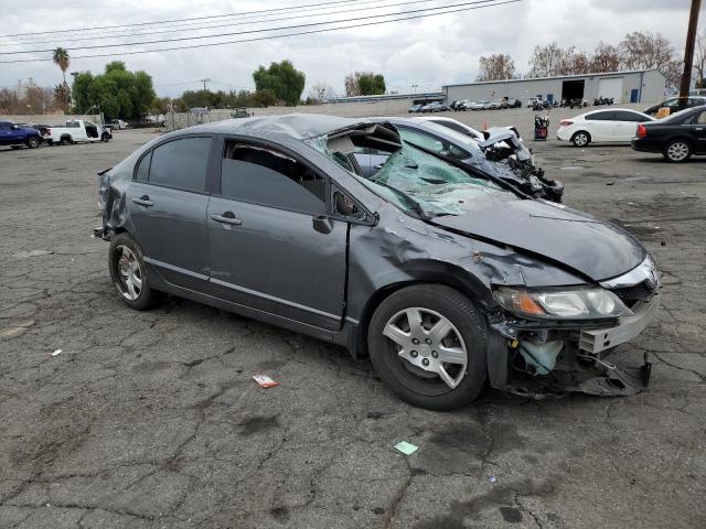 Photo 4 from auction – 2011 HONDA CIVIC LX with VIN 19XFA1F50BE031999