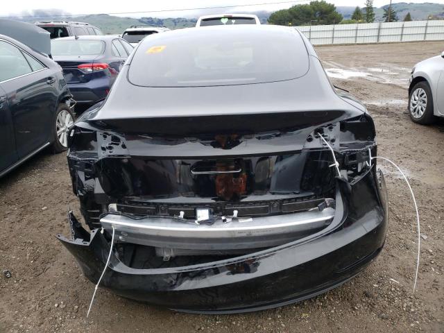 Photo 6 from auction – 2021 TESLA MODEL 3 with VIN 5YJ3E1EC3MF995565