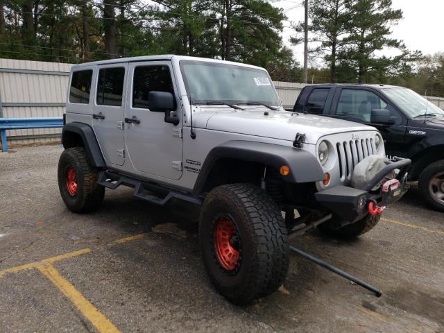Photo 4 from auction – 2011 JEEP WRANGLER U with VIN 1J4BA3H11BL508753