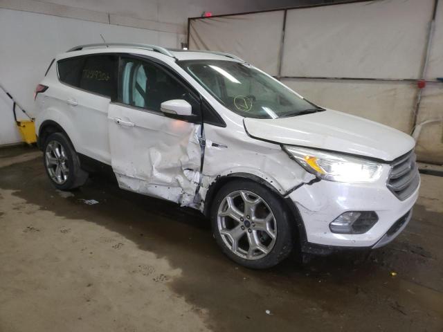 Photo 4 from auction – 2017 FORD ESCAPE TIT with VIN 1FMCU0J90HUE34191