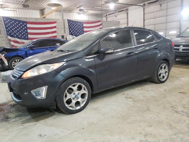FORD FIESTA SEL 2011 with VIN 3FADP4CJ7BM100353 - Photo from auction