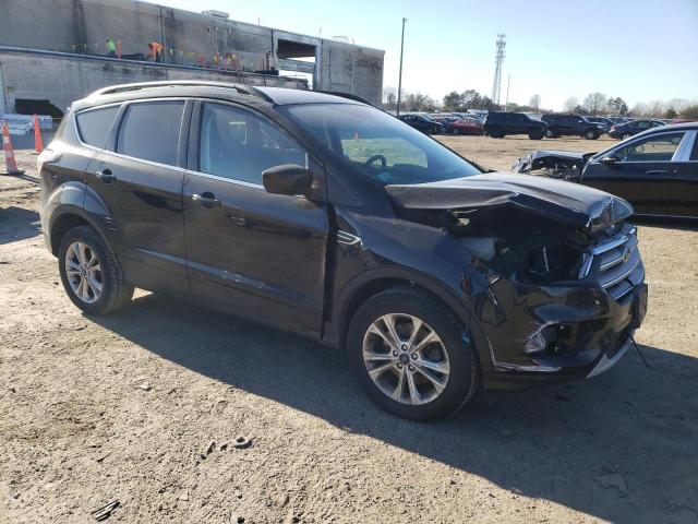 Photo 4 from auction – 2017 FORD ESCAPE SE with VIN 1FMCU9GD8HUE82683