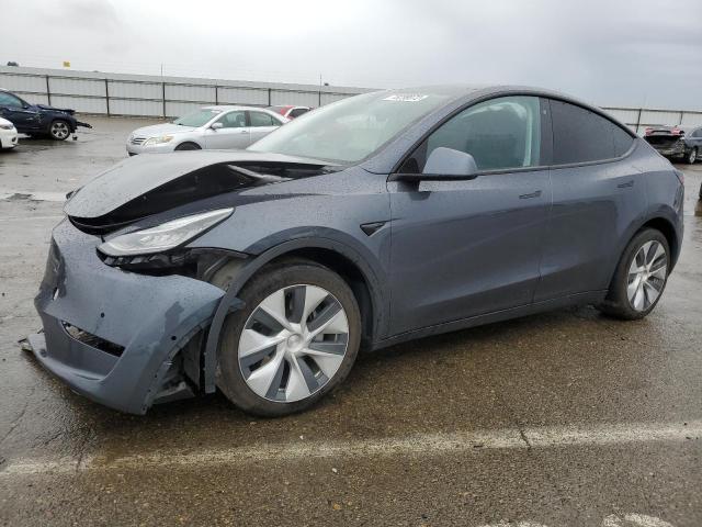 TESLA MODEL Y 2020 with VIN 5YJYGDEE0LF053863 - Photo from auction
