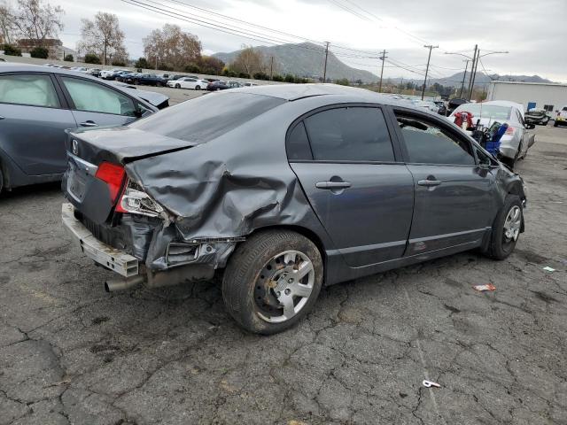 Photo 3 from auction – 2011 HONDA CIVIC LX with VIN 19XFA1F50BE031999