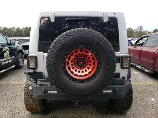 Photo 6 from auction – 2011 JEEP WRANGLER U with VIN 1J4BA3H11BL508753