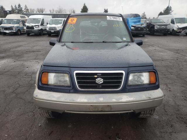 Photo 5 from auction – 1996 SUZUKI SIDEKICK S with VIN JS3TD21VXT4100998