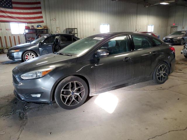 FORD FOCUS SE 2016 with VIN 1FADP3F2XGL229579 - Photo from auction