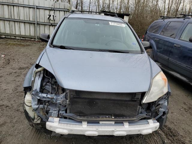 Photo 5 from auction – 2011 HONDA CR-V SE with VIN JHLRE4H43BC027141