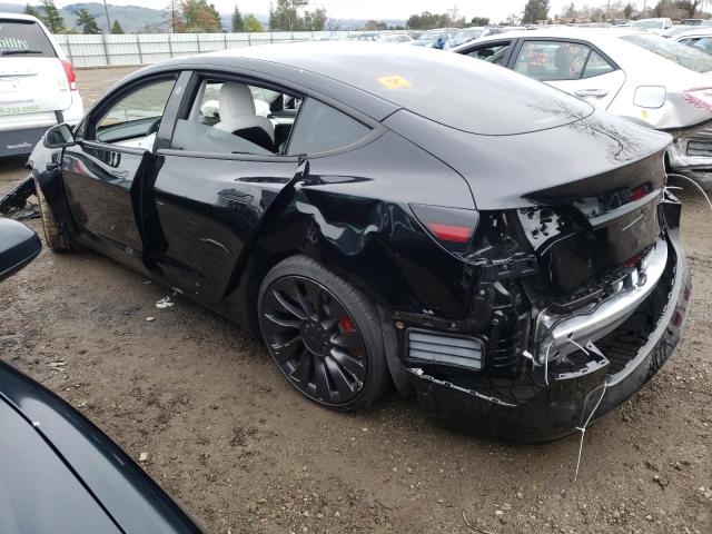 Photo 2 from auction – 2021 TESLA MODEL 3 with VIN 5YJ3E1EC3MF995565