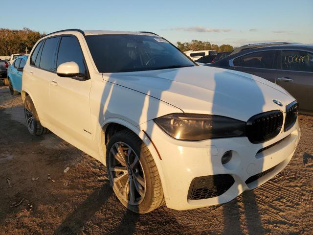 Photo 13 from auction – 2014 BMW X5 XDRIVE5 with VIN 5UXKR6C59E0J71618