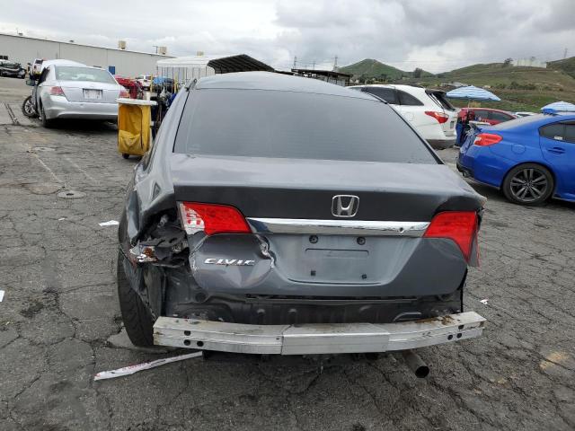 Photo 6 from auction – 2011 HONDA CIVIC LX with VIN 19XFA1F50BE031999