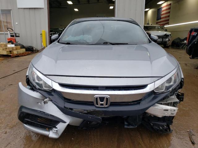 Photo 5 from auction – 2018 HONDA CIVIC LX with VIN 19XFC2F55JE036680