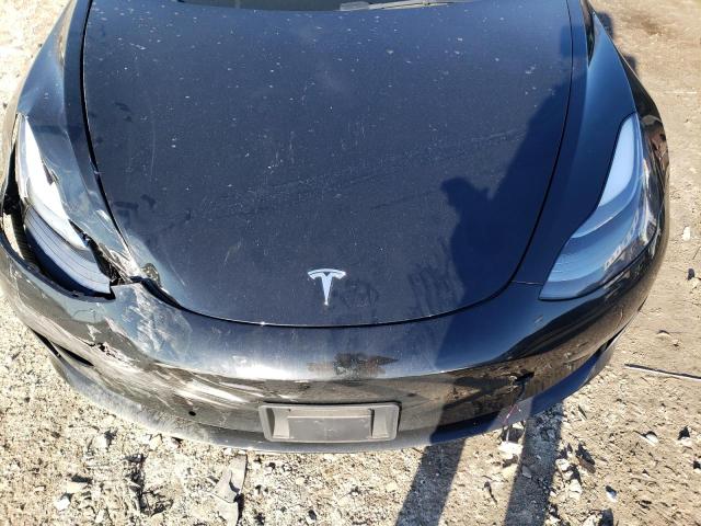 Photo 11 from auction – 2022 TESLA MODEL 3 with VIN 5YJ3E1EA0NF186301