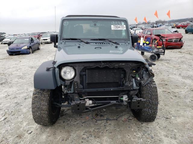Photo 5 from auction – 2014 JEEP WRANGLER U with VIN 1C4BJWFG4EL279939