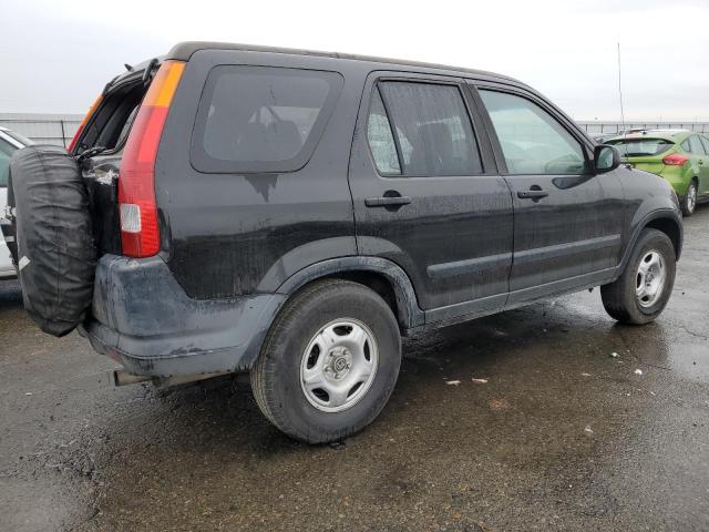 Photo 3 from auction – 2002 HONDA CR-V LX with VIN JHLRD68432C002173